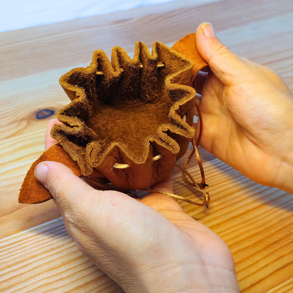 Opened leather pouch for coins 